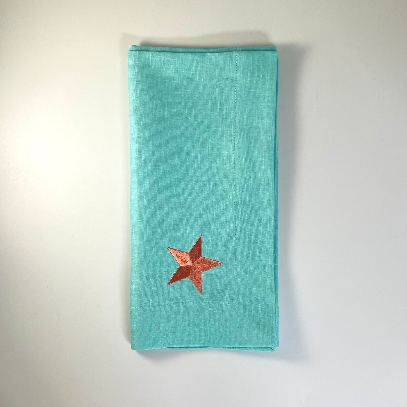Turquoise and Orange Linen Napkin with Embroidered Star