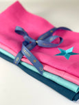 Turquoise and Orange Linen Napkin with Embroidered Star